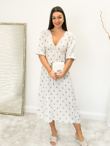 Beżowa muślinowa sukienka z wiązaniem na plecach