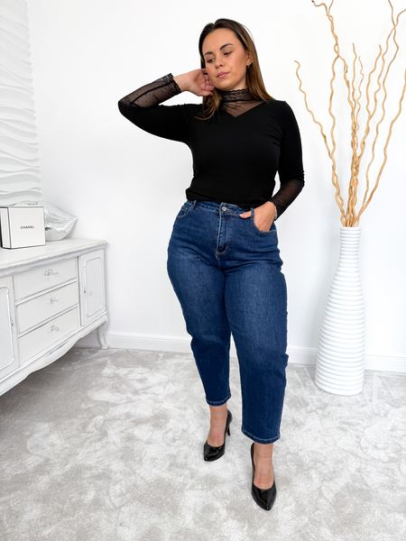 Granatowe spodnie jeansowe o fasonie balloon