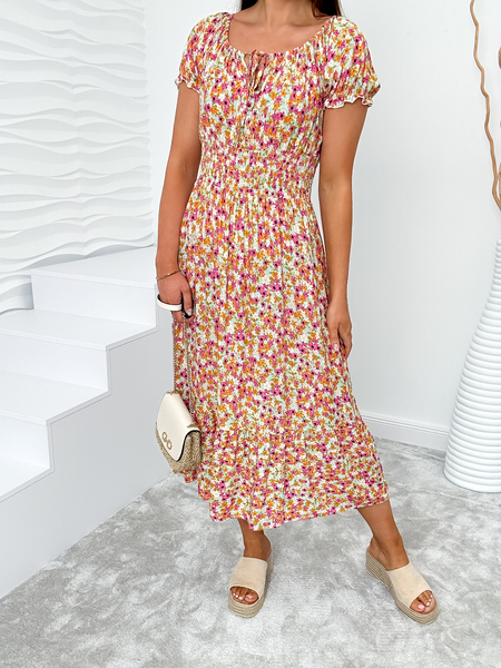 Różowa sukienka w kwiaty z wiązanym dekoltem Irene