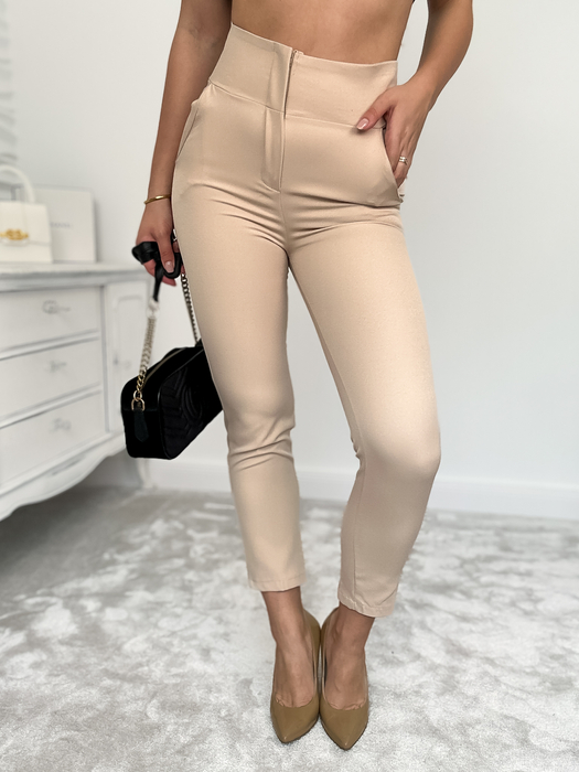 Beżowe spodnie cygaretki z krytym zamkiem